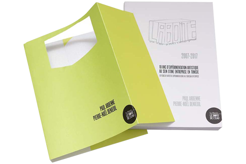 Die-cut jacket White hardcover book with a yellow die-cut jacket